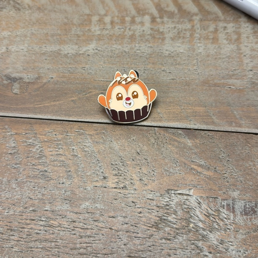 Disney Munchlings pin, Dale as a dark chocolate ganache truffle cupcake